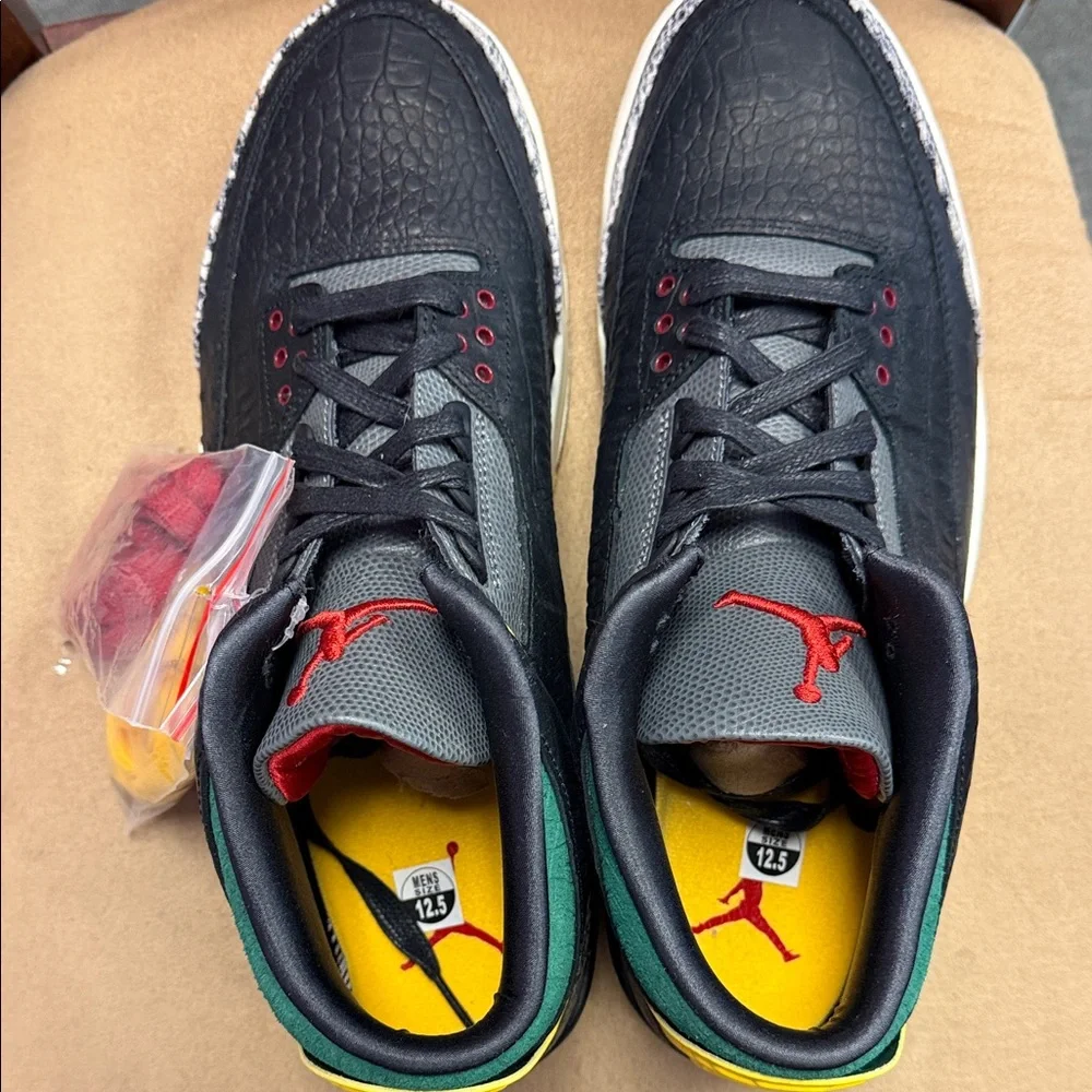 Jordan Low-Top Sneakers in Black with Red, Yellow, and Green Accents